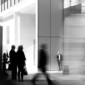 Blurred figures in a crowded place