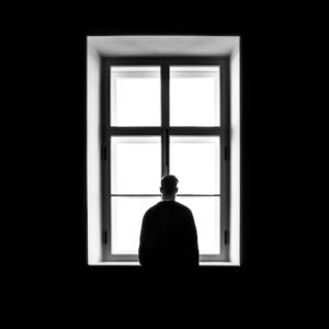 Standing at a window