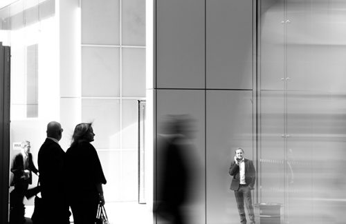 Blurred figures in a crowded place